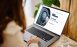 Women looking at Eco Driving course on laptop