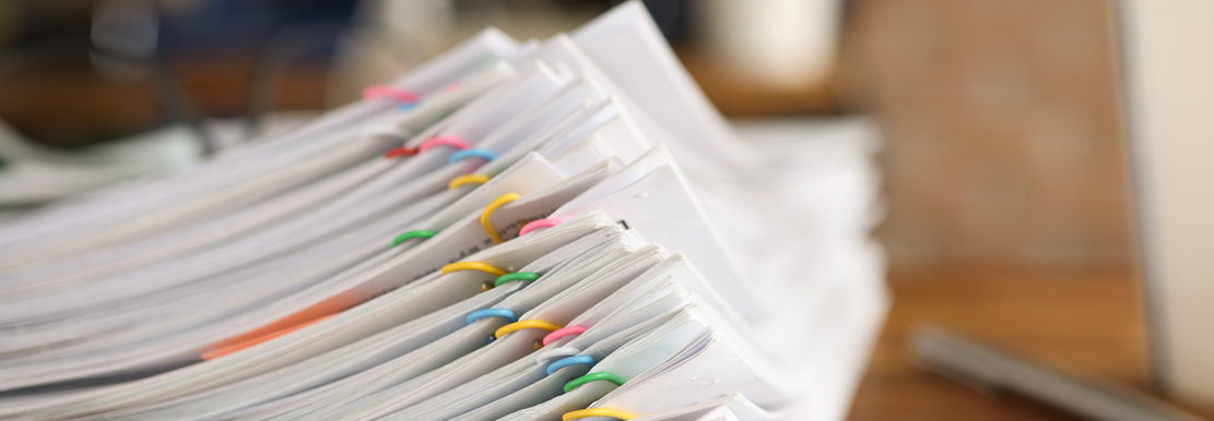 Stack of files and papers banner