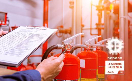 Man carrying out fire safety inspection