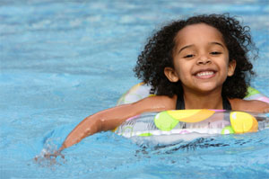 Child paddling.