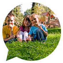 children sitting on grass